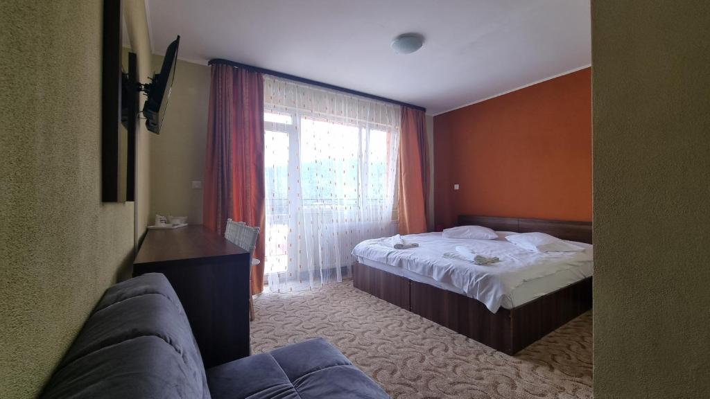 Postel nebo postele na pokoji v ubytování Hotel Iri