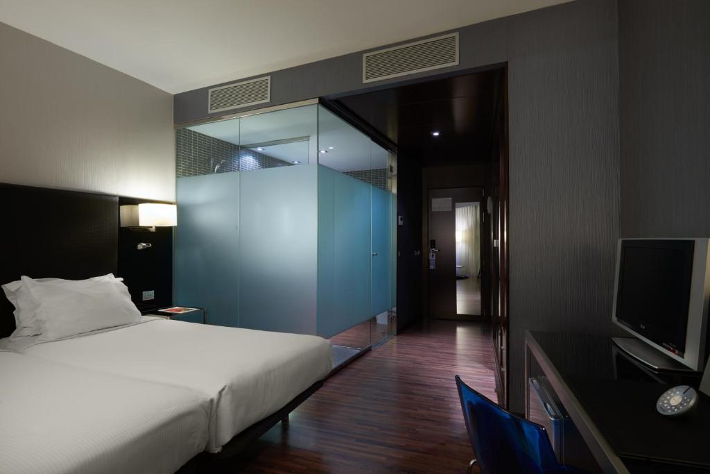 Cama o camas de una habitación en Eurostars Monte Real
