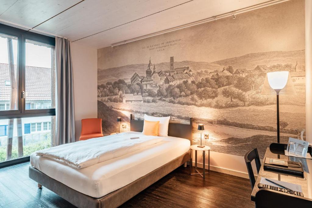 Postel nebo postele na pokoji v ubytování Hotel Greuterhof Islikon