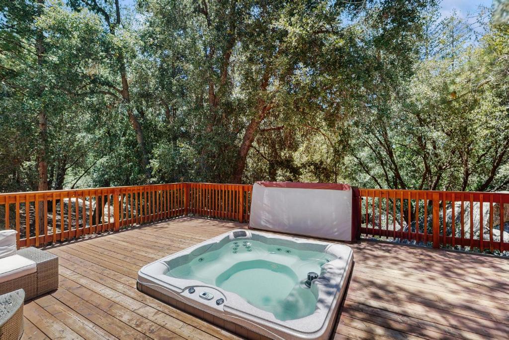 a hot tub sitting on top of a deck at Wildwood Cottage in Idyllwild