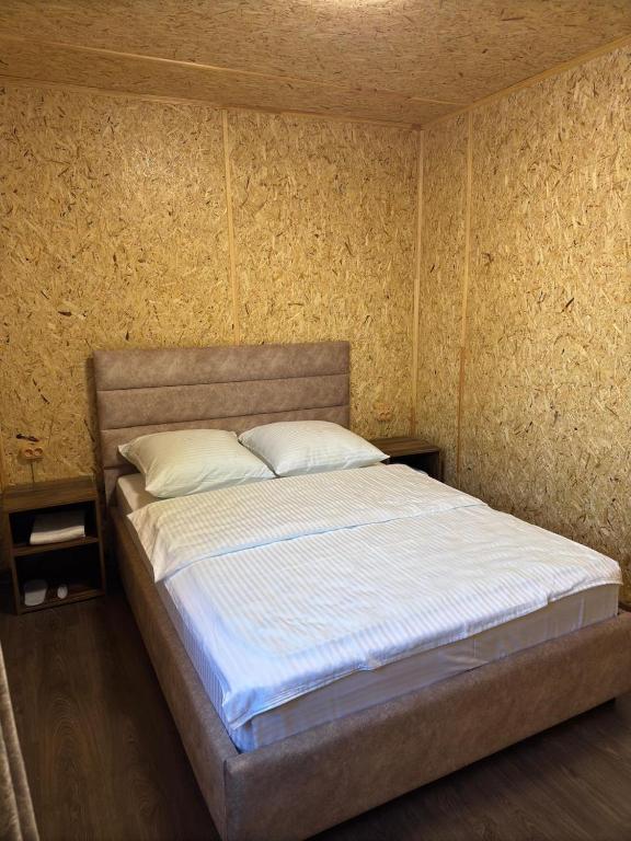 Postel nebo postele na pokoji v ubytování Hayots Ojakh