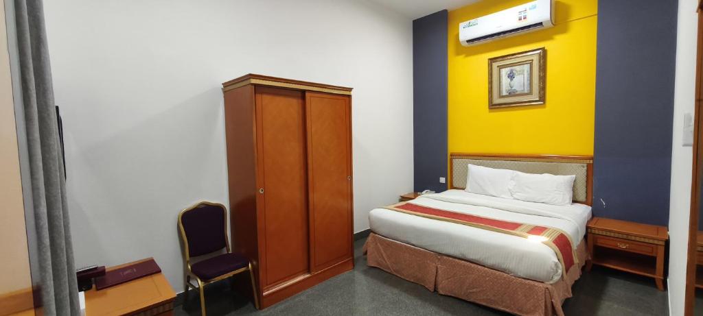 Postel nebo postele na pokoji v ubytování Safeer International Hotel By Brothers International