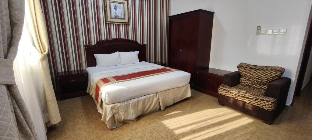 Postel nebo postele na pokoji v ubytování Safeer International Hotel By Brothers International