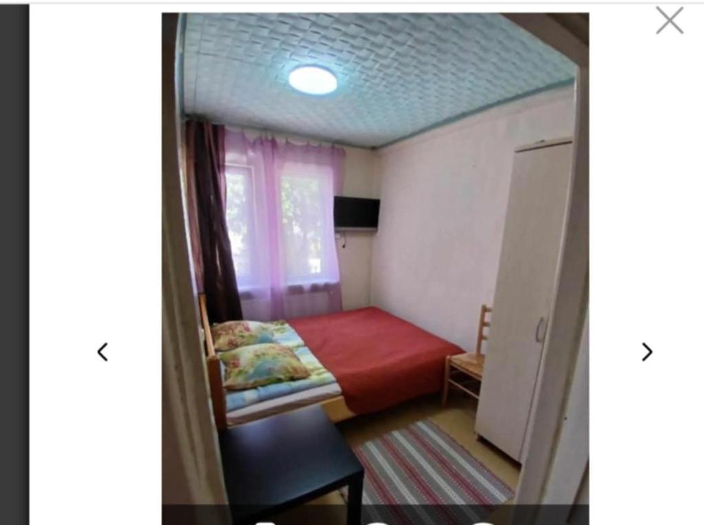Cama o camas de una habitación en Nuoma centre