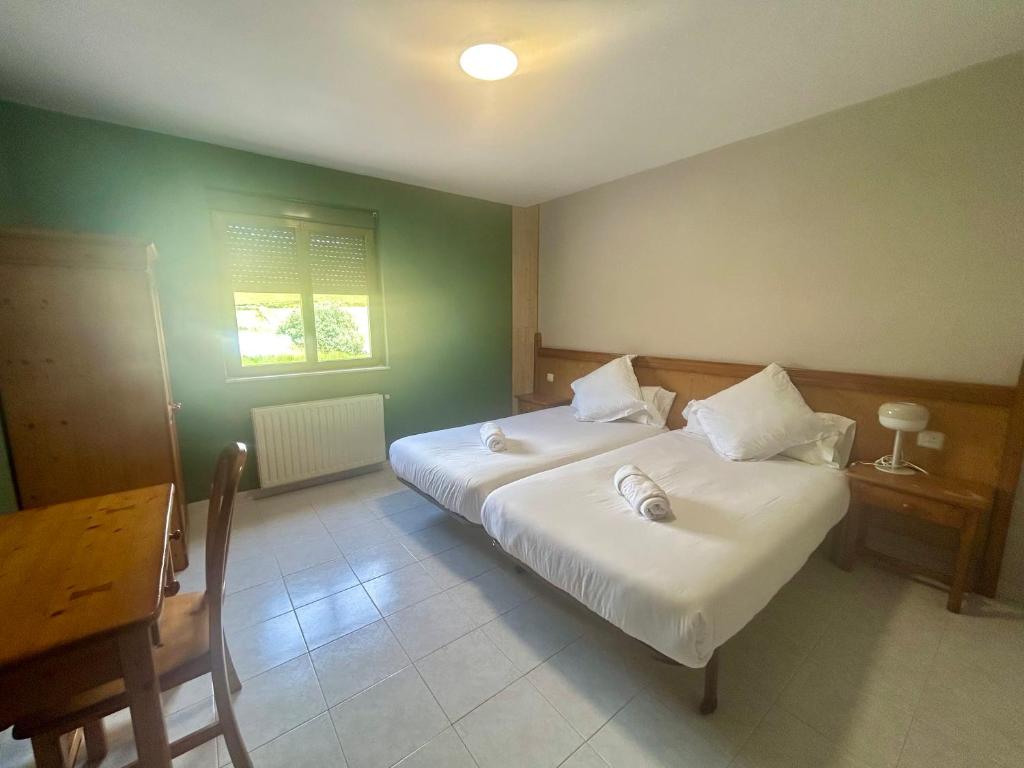 Postel nebo postele na pokoji v ubytování Coronel Somiedo by Unusual Hotels