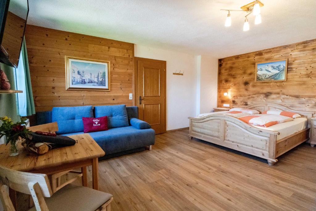 Postel nebo postele na pokoji v ubytování Alpengasthof Eppensteiner