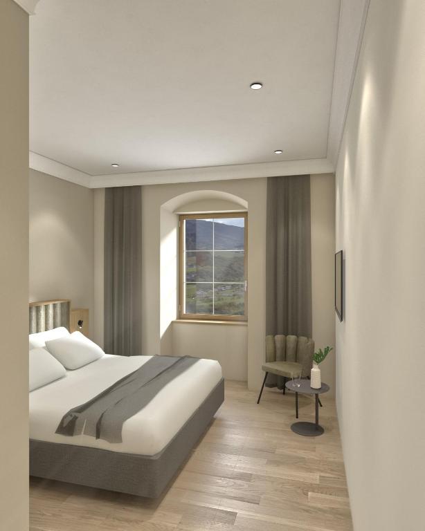 Postel nebo postele na pokoji v ubytování Gasthof Hotel Post