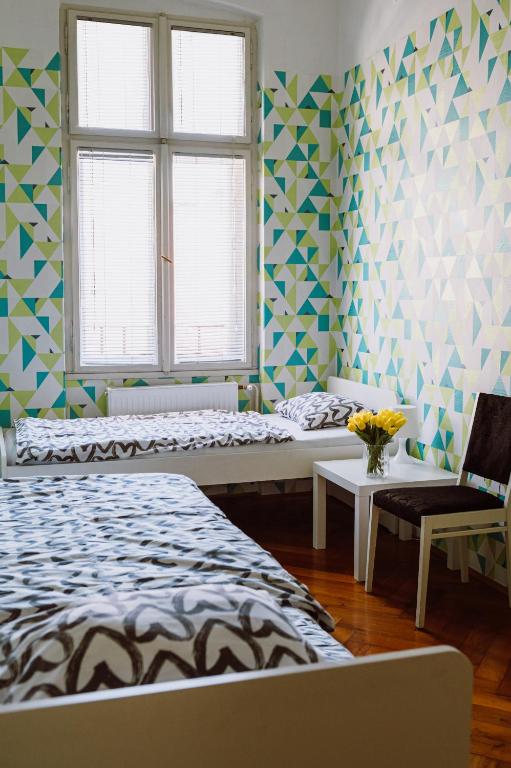 Postel nebo postele na pokoji v ubytování Guesthouse Centar 2