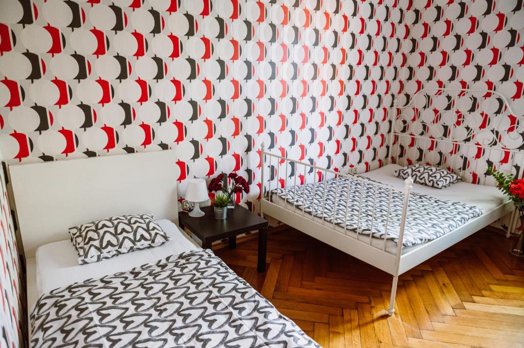 Postel nebo postele na pokoji v ubytování Guesthouse Centar 2