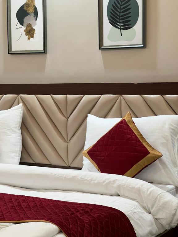 Postel nebo postele na pokoji v ubytování RJ-02 Hotel