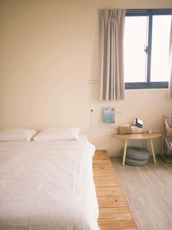 Postel nebo postele na pokoji v ubytování Lunos homestay