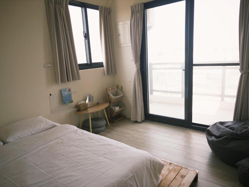 Postel nebo postele na pokoji v ubytování Lunos homestay