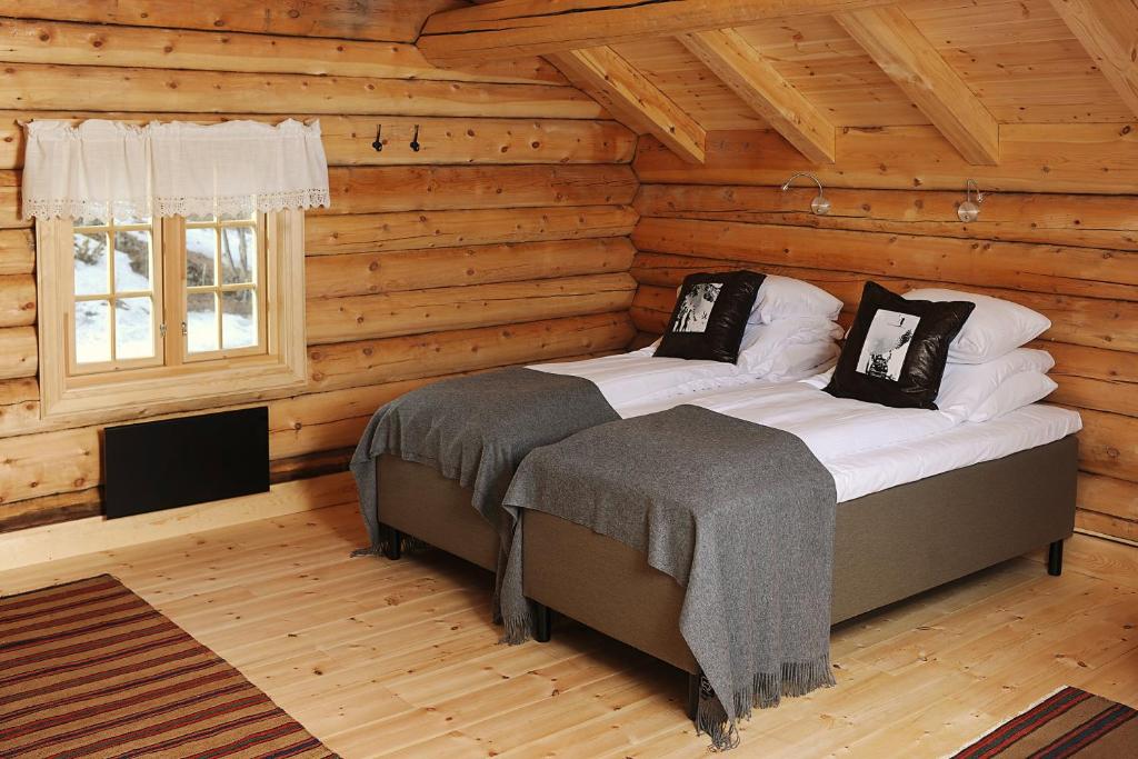 Postel nebo postele na pokoji v ubytování Bjerkeløkkja Bed and Breakfast
