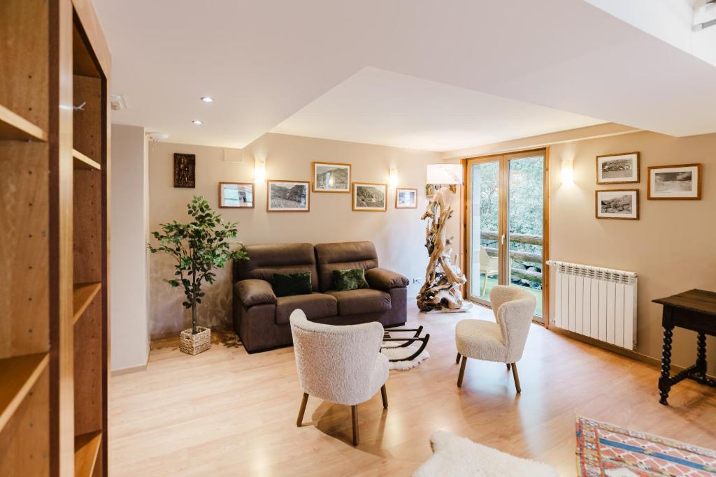 Area soggiorno di Apartaments La Neu