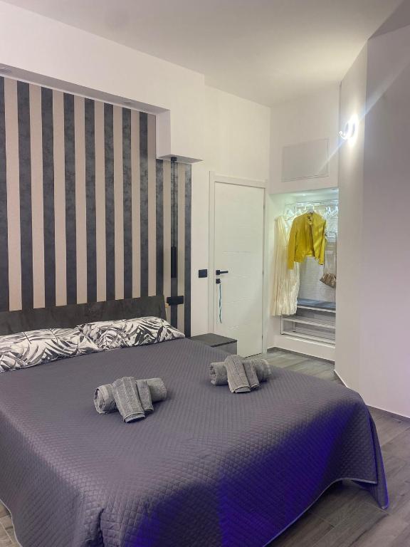 Postel nebo postele na pokoji v ubytování La Fenice 40