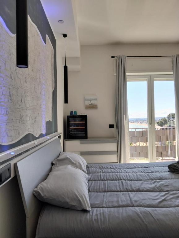Postel nebo postele na pokoji v ubytování La Fenice 40
