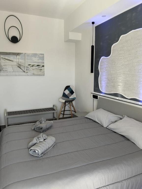 Postel nebo postele na pokoji v ubytování La Fenice 40