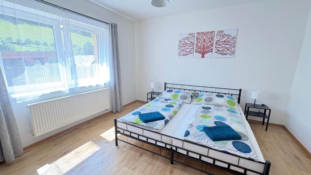 Postel nebo postele na pokoji v ubytování Ubytko u Karla