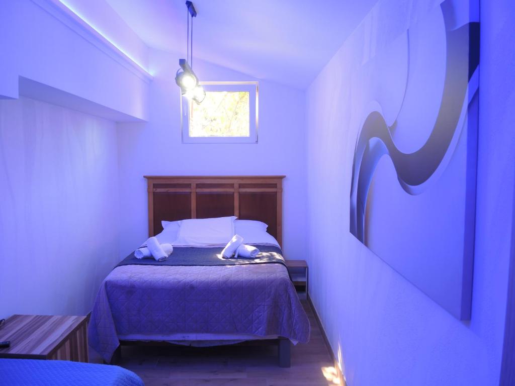 Postel nebo postele na pokoji v ubytování Rooms&Restaurant 43