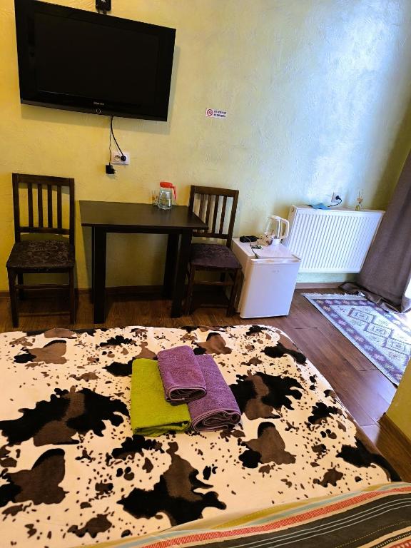 TV a/nebo společenská místnost v ubytování Glori