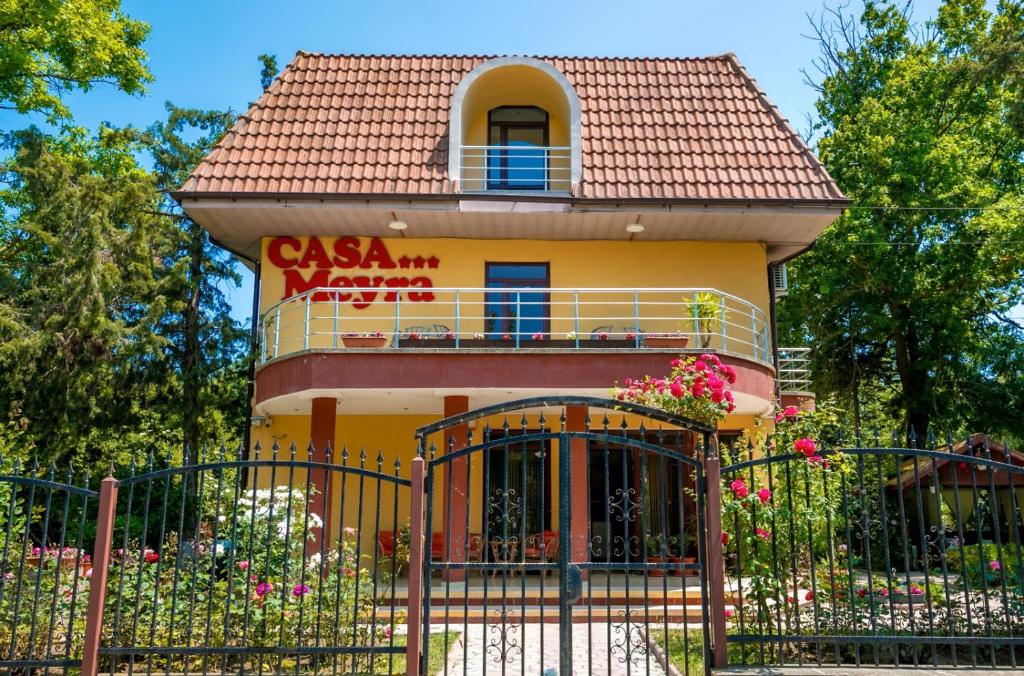 a building with a gate in front of it at Casa Meyra in Jupiter