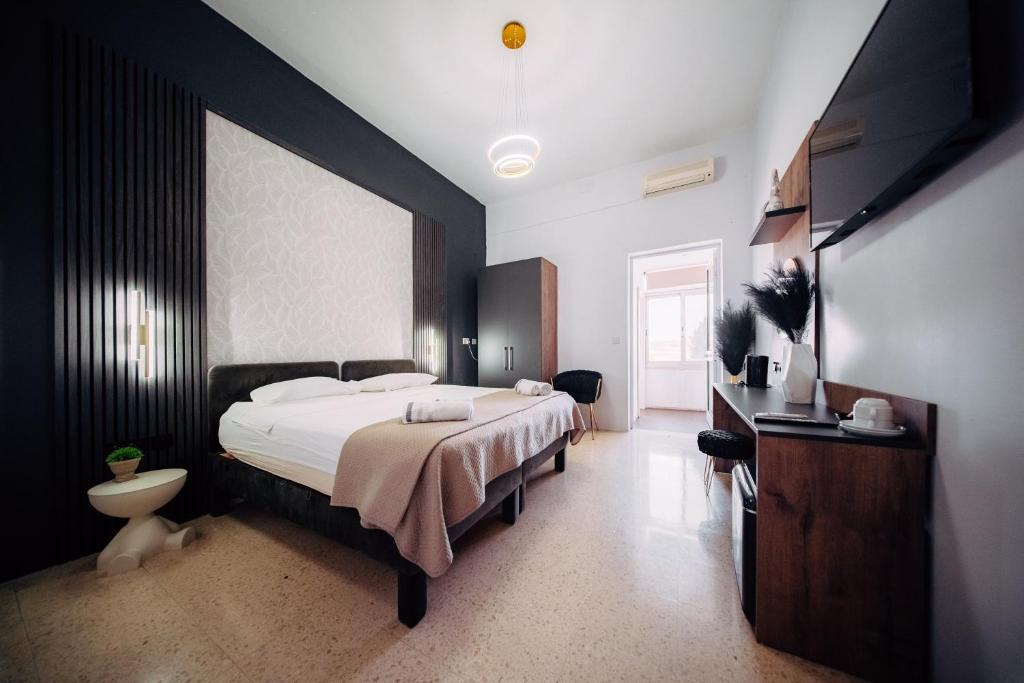 Postel nebo postele na pokoji v ubytování Rapture Gozo - Guesthouse
