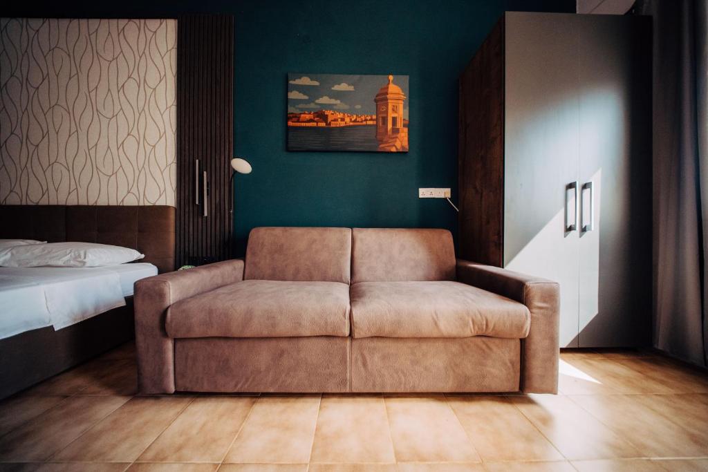 Postel nebo postele na pokoji v ubytování Rapture Gozo - Guesthouse