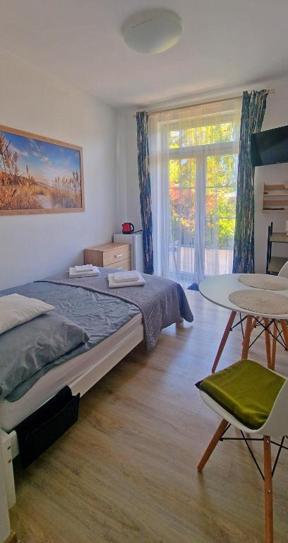 Postel nebo postele na pokoji v ubytování Nautilus Pearl