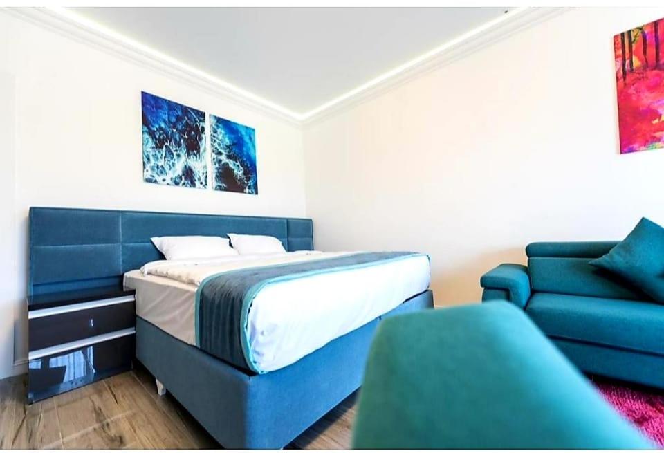 En eller flere senge i et værelse på Studio White Tower - Mamaia Nord