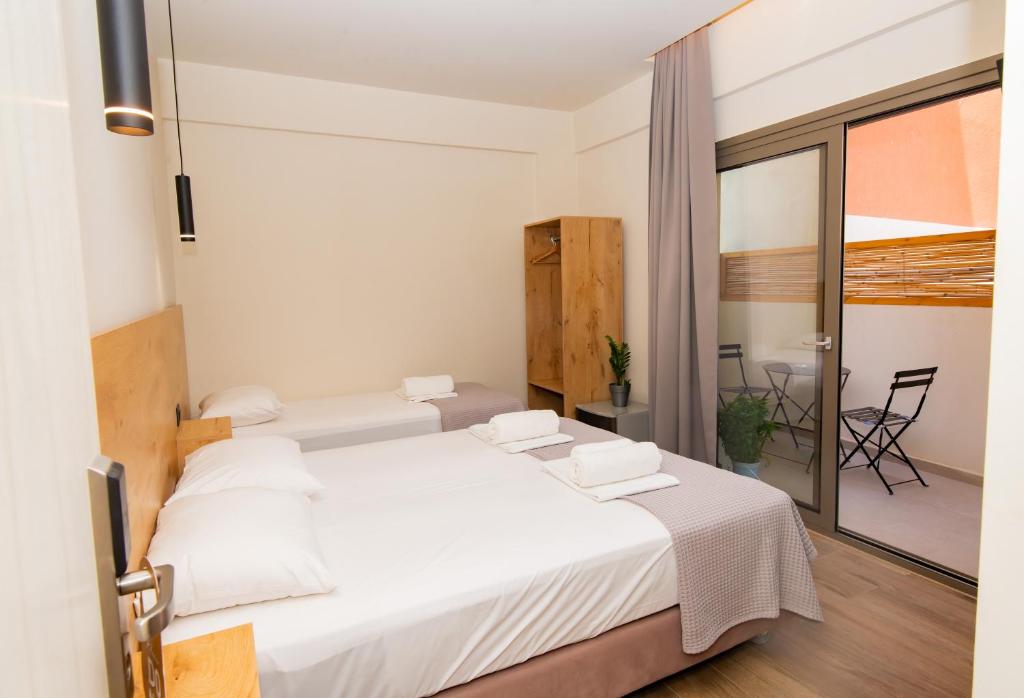 Postel nebo postele na pokoji v ubytování Lunar Hotel Modern Boutique