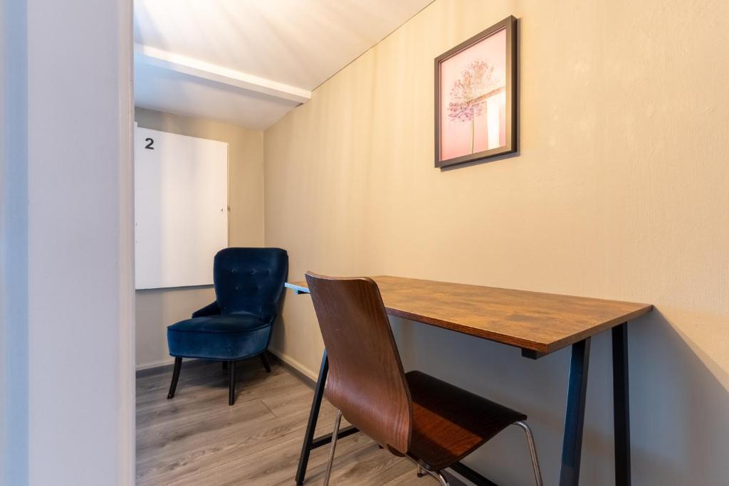 Posezení v ubytování MUE Cubes - Capsule Hotel