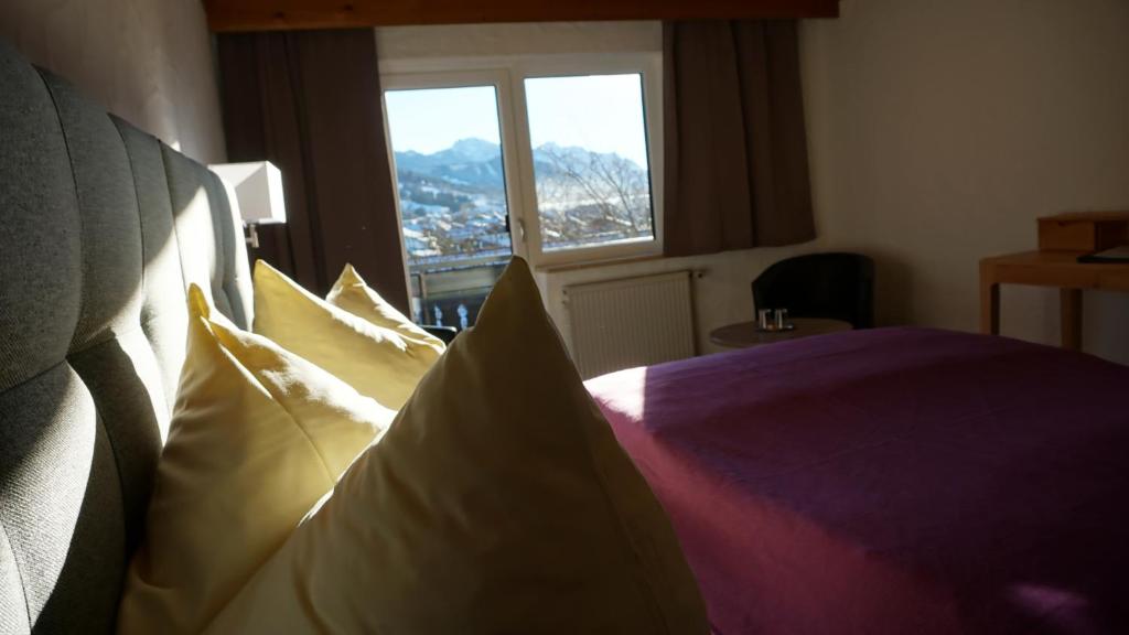 Postel nebo postele na pokoji v ubytování Hotel Sonnenbichl