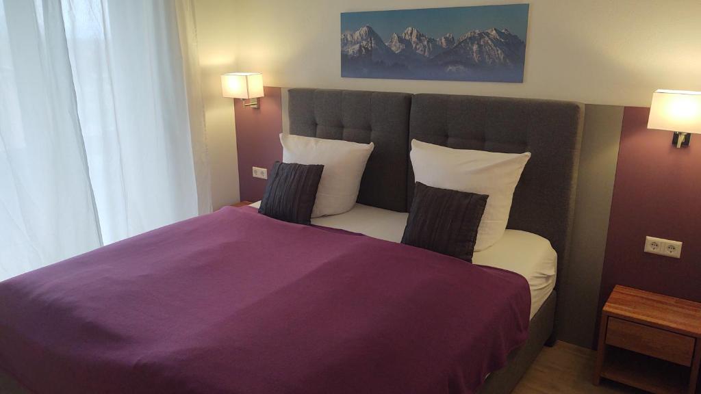 Postel nebo postele na pokoji v ubytování Hotel Sonnenbichl