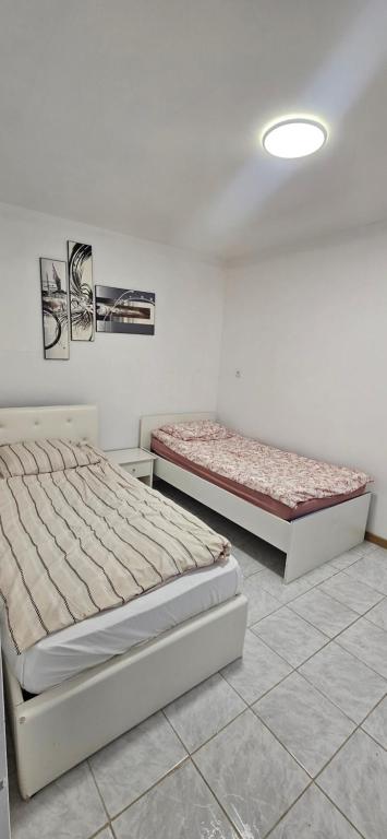Ένα ή περισσότερα κρεβάτια σε δωμάτιο στο Appartement idéalement situé