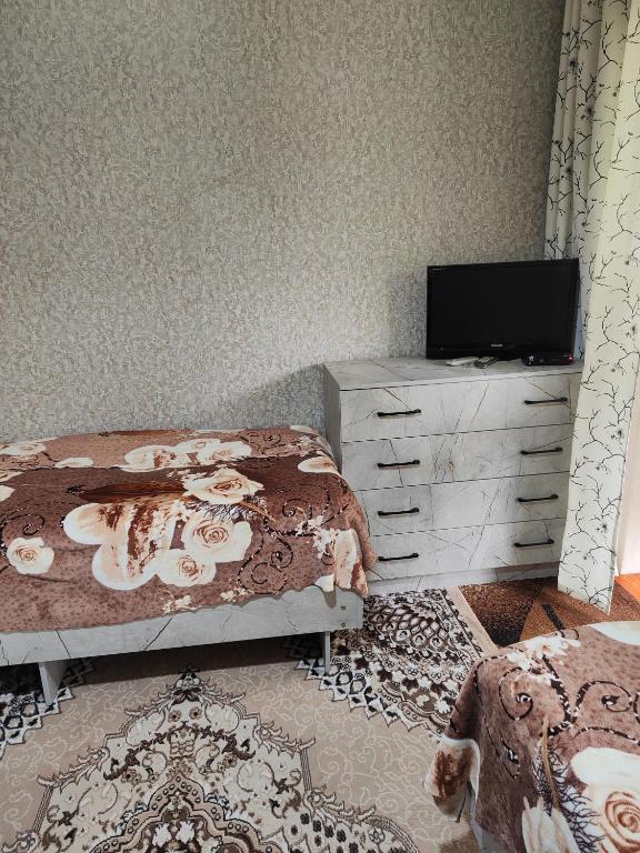 Postel nebo postele na pokoji v ubytování Olga Guest House