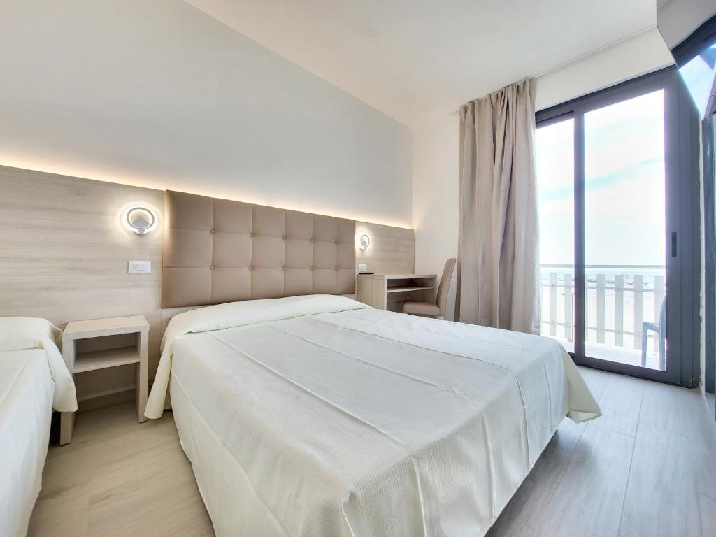 Postel nebo postele na pokoji v ubytování Hotel Villa Sole Resort