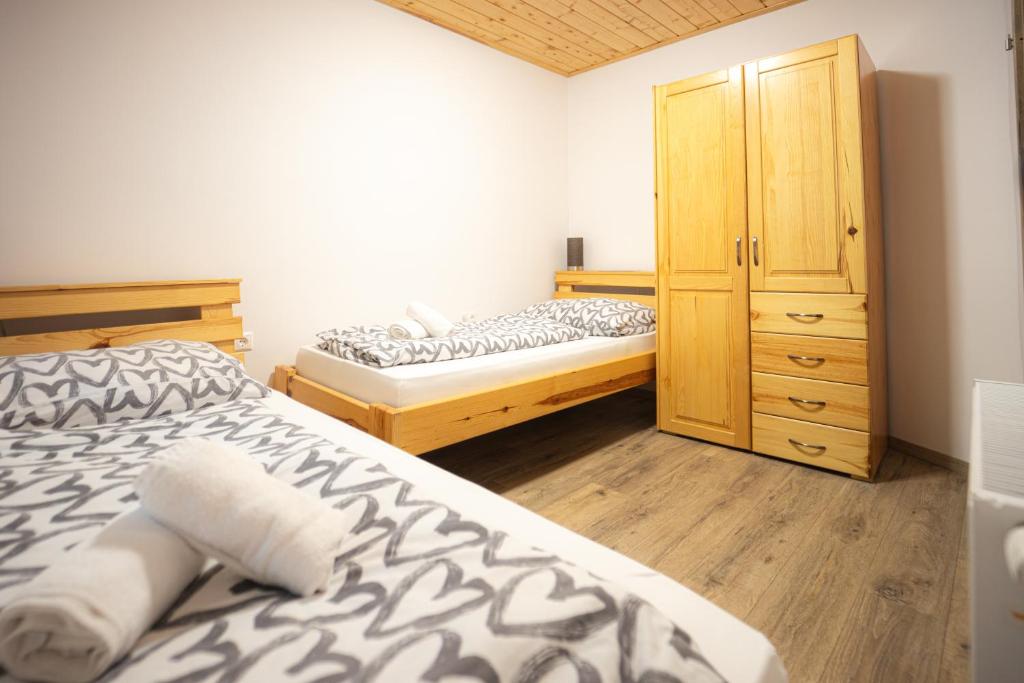 Postel nebo postele na pokoji v ubytování Apartmenthaus Esther