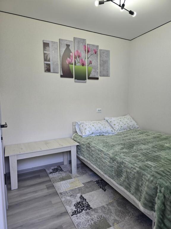 Postel nebo postele na pokoji v ubytování Olga Guest House