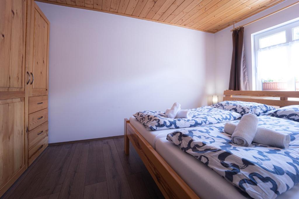Postel nebo postele na pokoji v ubytování Apartmenthaus Esther