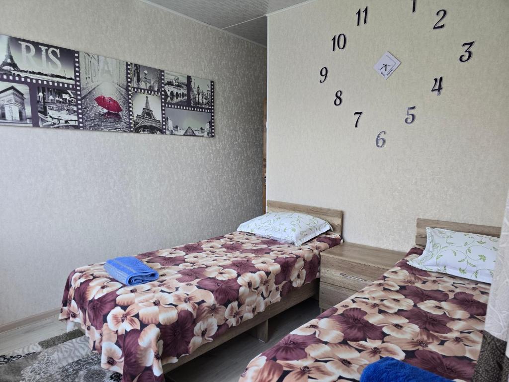 Postel nebo postele na pokoji v ubytování Olga Guest House