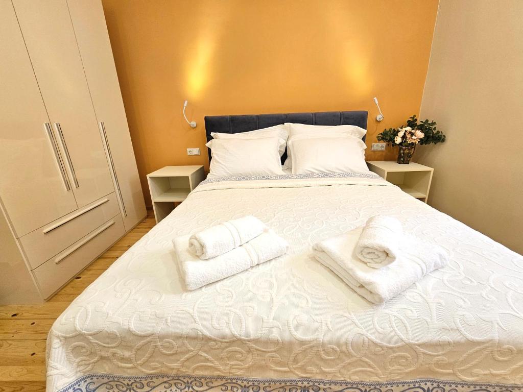 Giường trong phòng chung tại Central Bliss Apartments No2