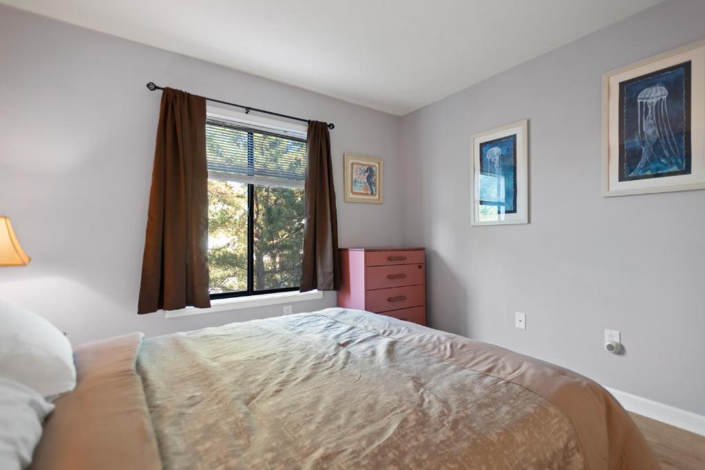 Postel nebo postele na pokoji v ubytování Beach Place