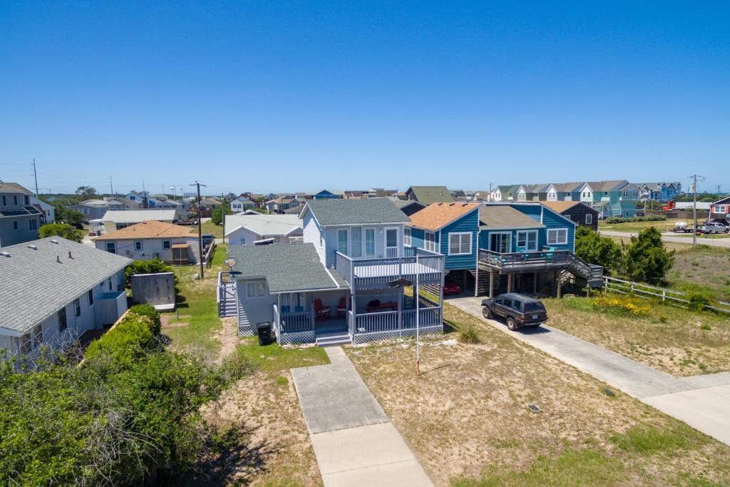 an aerial view of a residential neighborhood with houses at Blackbird Inn in Kill Devil Hills