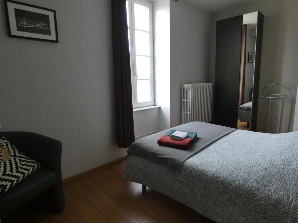 Postel nebo postele na pokoji v ubytování Gîte la loutière