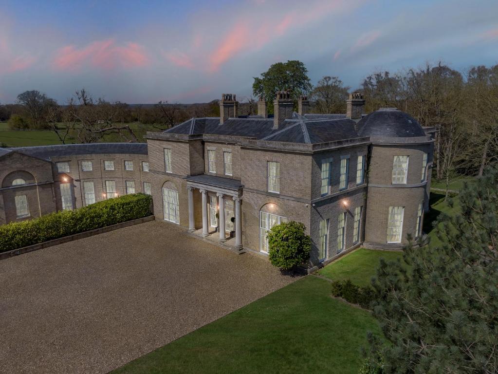 an aerial view of a large brick house at Must see - Georgian Mansion I Suffolk Retreat in Beccles