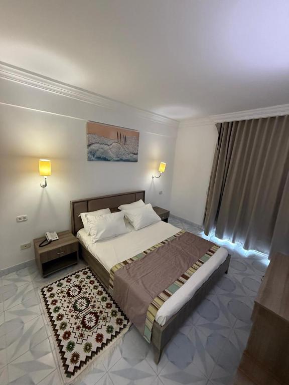 Postel nebo postele na pokoji v ubytování TREE HOUSE HOTEL Sousse