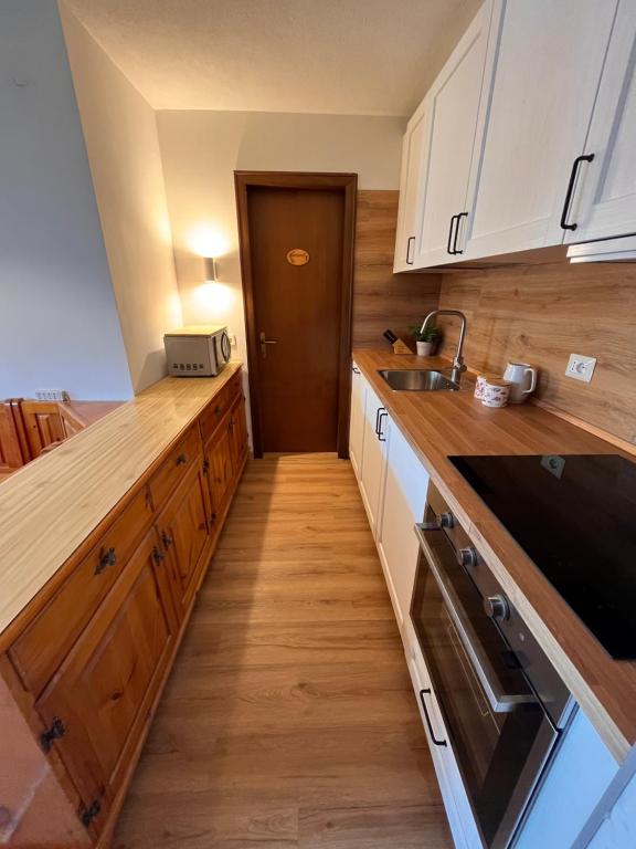 Kuchyň nebo kuchyňský kout v ubytování Rifugetto
