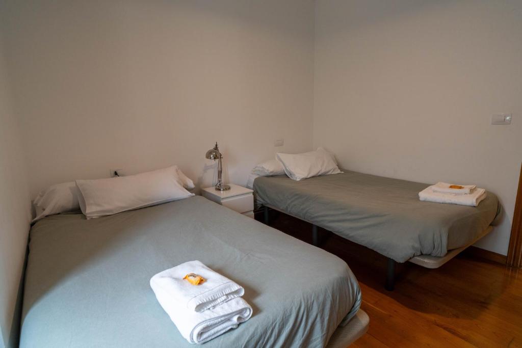 Posteľ alebo postele v izbe v ubytovaní Apartamento Sarmiento- Casco histórico Mondoñedo