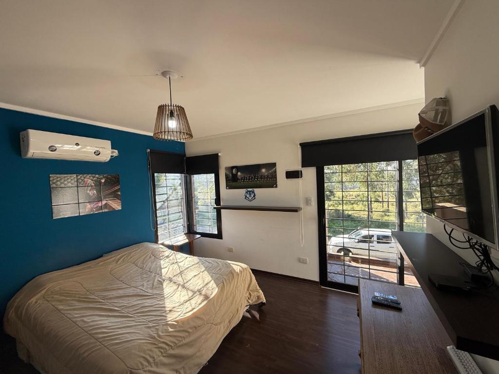 Ένα ή περισσότερα κρεβάτια σε δωμάτιο στο Quinta en City Bell