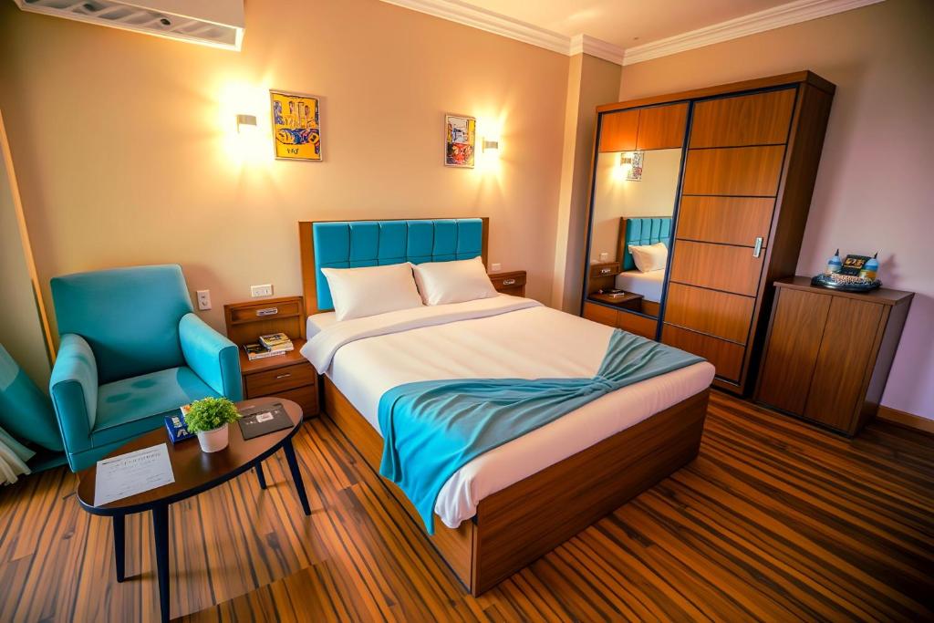 Postel nebo postele na pokoji v ubytování PYramiDS OaSiS ViEW HoTeL